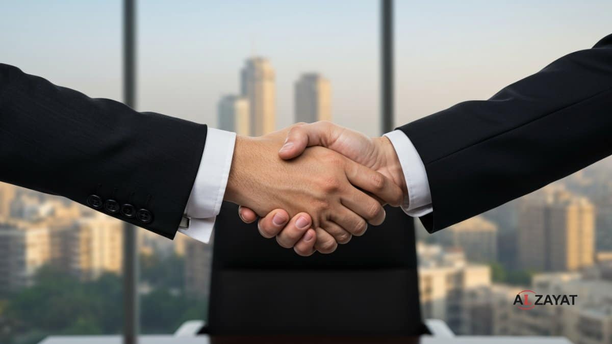 An image representing the successful outcome of engaging with top corporate law firms in Egypt, featuring two hands shaking to close a major deal, stamped with the firm logo.